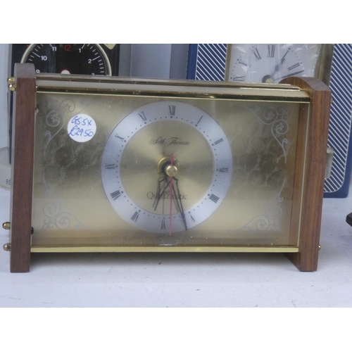 373 - A collection of 5 ex shop stock clocks.