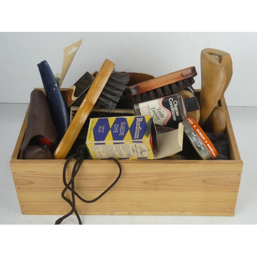 374 - A vintage shoe shine box & contents.