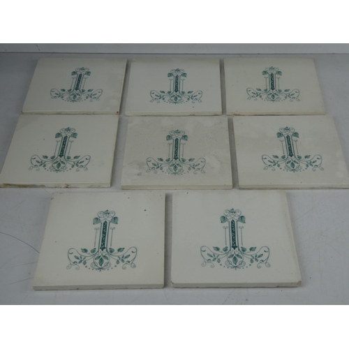 375 - A collection of 8 antique/ Art Nouveau tiles.