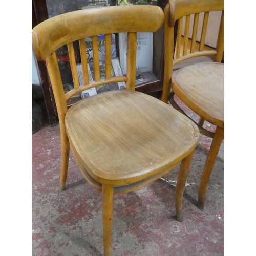 457 - A pair of vintage Bentwood chairs by The Polish Bentwood Furniture Industry, Krakow, with original l... 