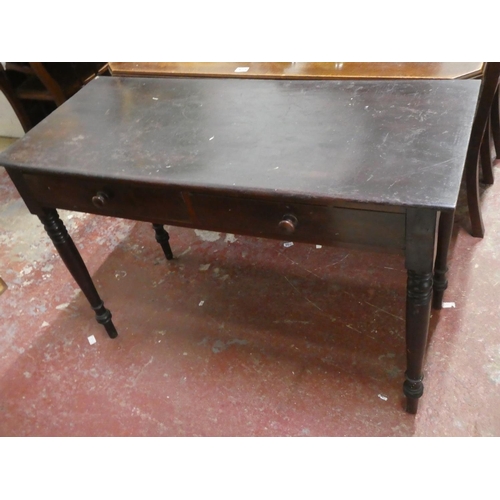 458 - An antique table with two drawers