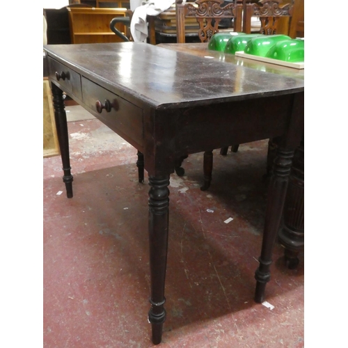 458 - An antique table with two drawers