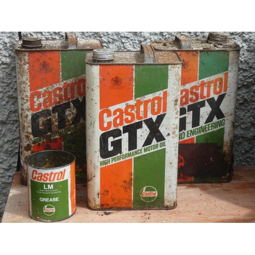 486 - Three vintage Castrol oil cans and another.