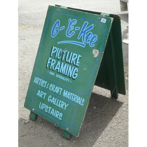 503 - A wooden v board shop sign, 100cm x 60cm.