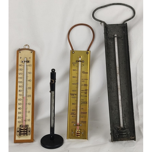 401 - Four vintage/ antique thermometers.