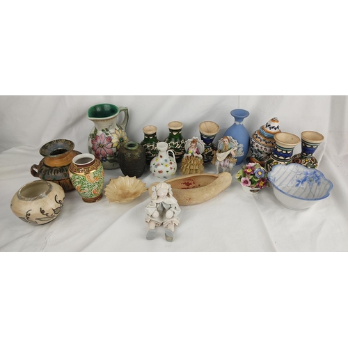 405 - A large lot of assorted ceramics ornaments, vases etc.