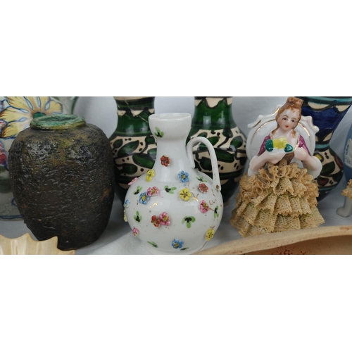 405 - A large lot of assorted ceramics ornaments, vases etc.