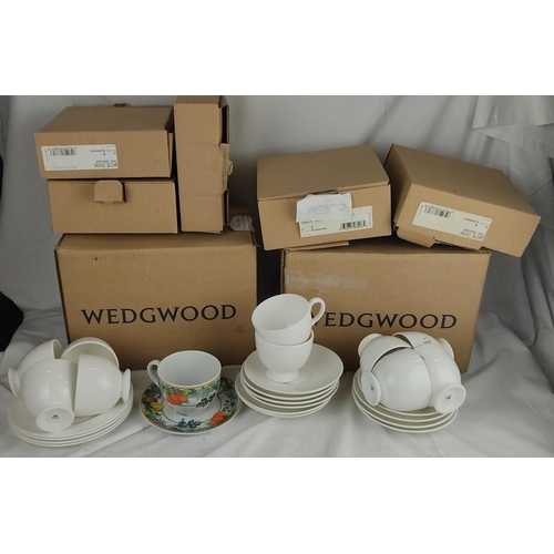 419 - A lot of Wedgwood white china cups, saucers and more.