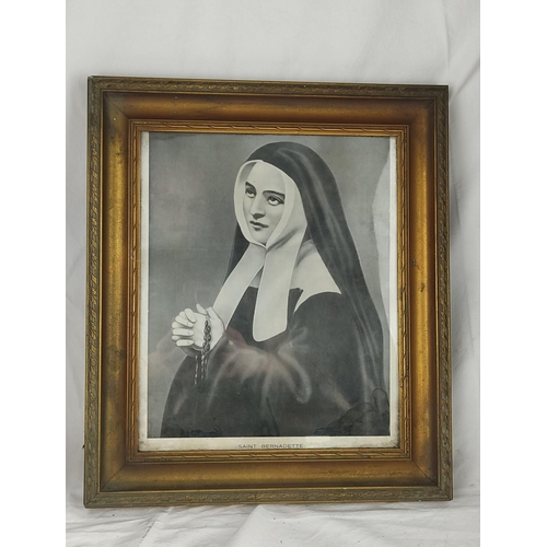 427 - An antique framed print 'Saint Bernadette', 39cm x 33cm.