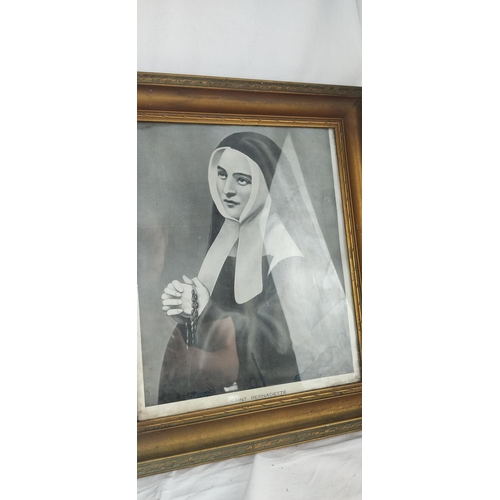 427 - An antique framed print 'Saint Bernadette', 39cm x 33cm.