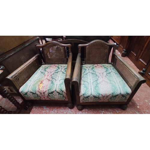 428 - A stunning pair of antique oak Berger backed lounge chairs.