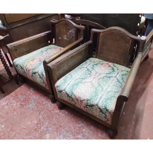 428 - A stunning pair of antique oak Berger backed lounge chairs.