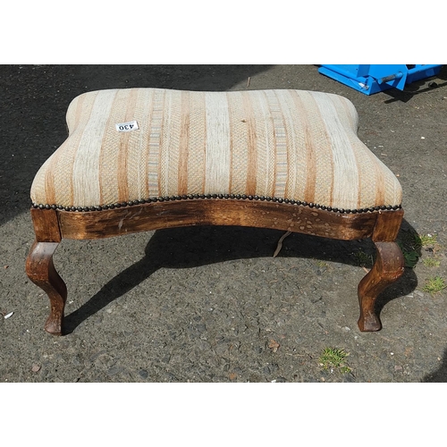 430 - An antique upholstered footstool.