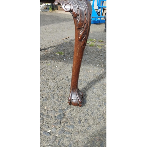 432 - An antique Berger backed chair, carved detail, ball and claw feet.