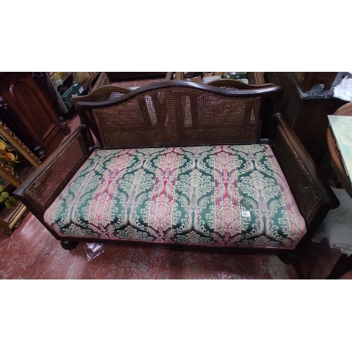 433 - A stunning antique oak Berger backed two seater settee.