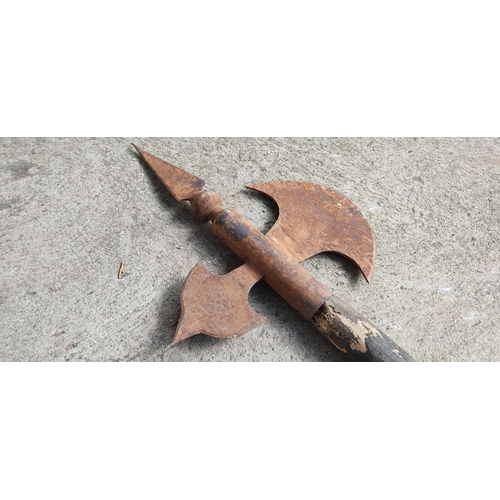 449 - An antique halberd axe, measuring 72cm long.