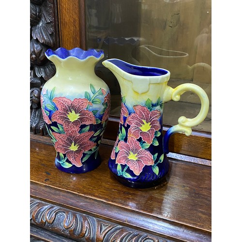 314 - A stunning Tupton Ware vase and jug set.