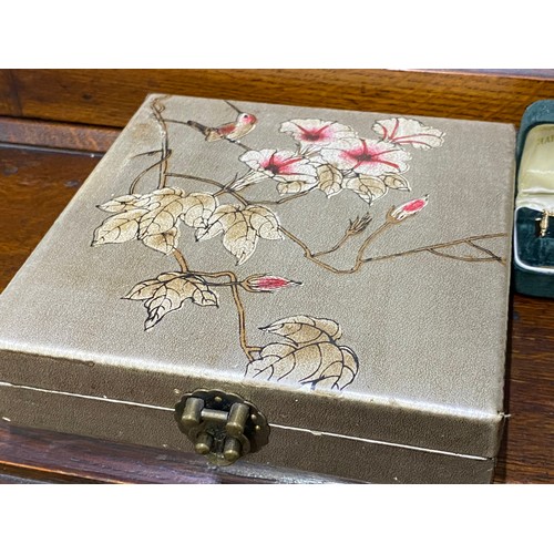 327 - A floral and bird design jewellery box, two gold plated tie pins and a gemstone necklace.