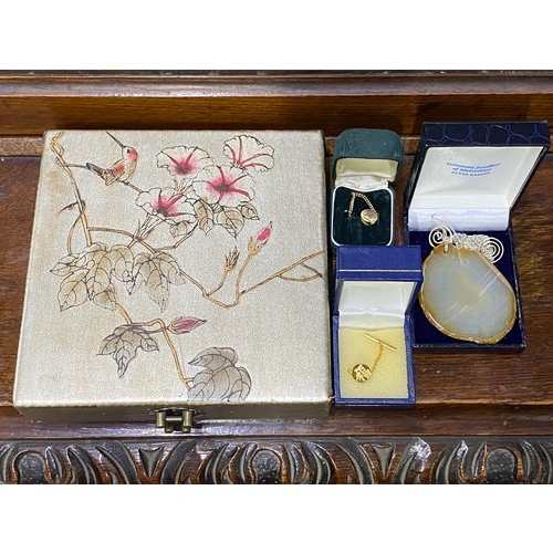 327 - A floral and bird design jewellery box, two gold plated tie pins and a gemstone necklace.