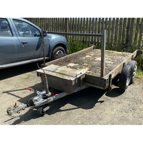 370 - A large double axle trailer, measuring 265