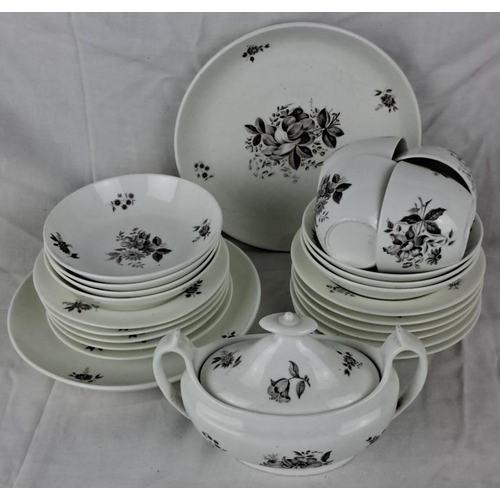 103 - Porcelain dinnerware set with floral motifs. Includes plates, bowls, cups, and a teapot with lid. Fe... 