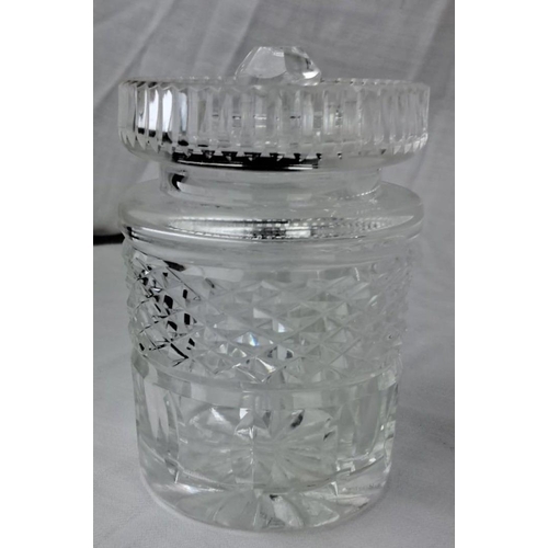 109 - A Waterford crystal lidded preserve jar with intricate diamond pattern and starburst design on the b... 