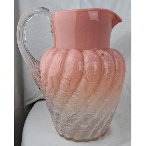 141 - Vintage pink and clear glass pitcher with a ribbed texture, clear glass handle and a gradated pink t... 