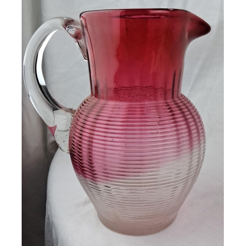 142 - Vintage ribbed glass pitcher with gradient transition from clear to deep crimson. Features a clear g... 