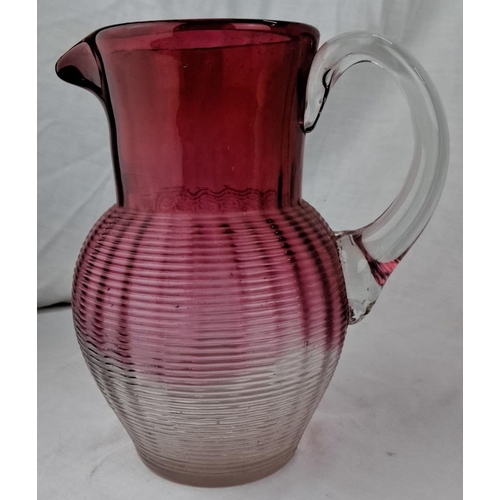 142 - Vintage ribbed glass pitcher with gradient transition from clear to deep crimson. Features a clear g... 