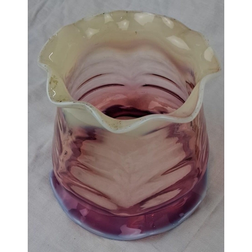 143 - An Unusual Hand-blown uranium glass shade with ruffled rim, featuring gradient shades of pink transi... 