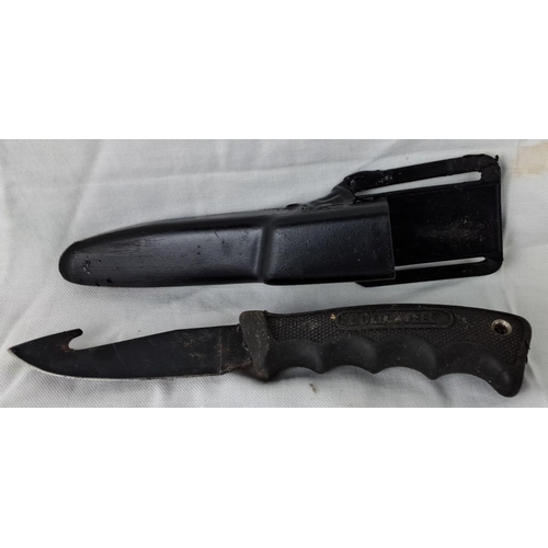 17 - Cold Steel knife with gut hook and textured grip handle, comes with original black sheath.