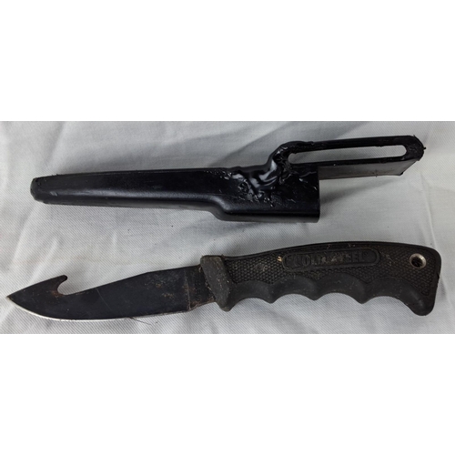 17 - Cold Steel knife with gut hook and textured grip handle, comes with original black sheath.