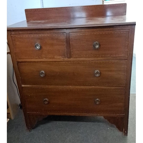 23 - Edwardian oak chest of drawers with four graduated drawers, featuring brass handles and dovetail joi... 