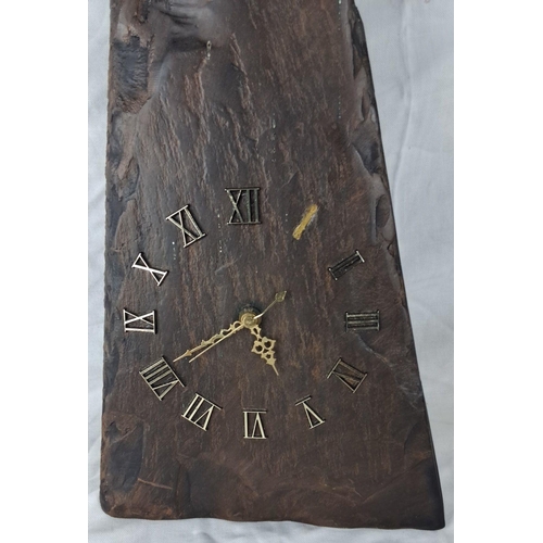 28 - Handcrafted slate clock with a unique triangular design, featuring Roman numeral markers and ornate ... 