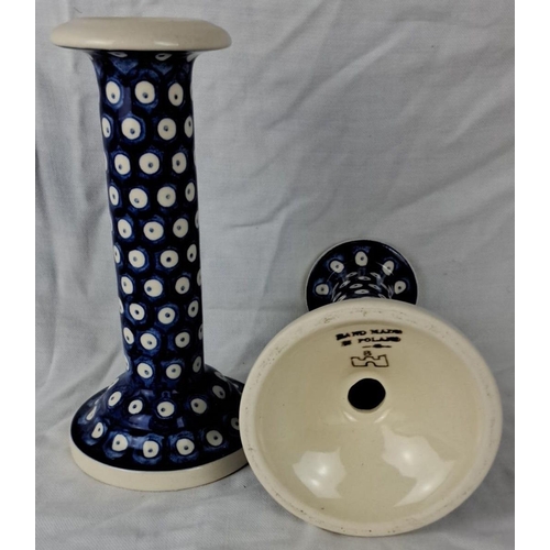 42 - Pair of Polish ceramic candlesticks featuring a navy blue and white polka dot design. Marked 