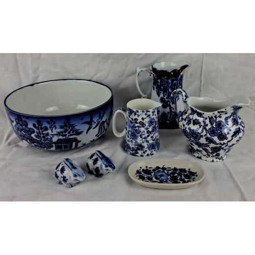 54 - Collection of Blue and White Porcelain: Includes a large bowl, four pitchers of various sizes, two s... 