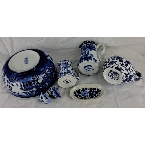 54 - Collection of Blue and White Porcelain: Includes a large bowl, four pitchers of various sizes, two s... 