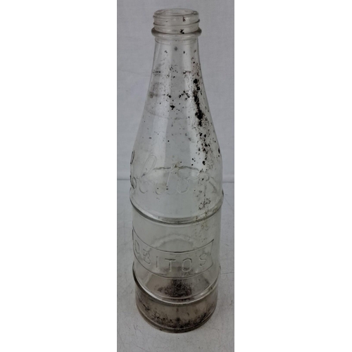 561 - Vintage clear glass soda bottle, embossed with 