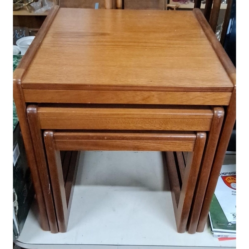 564 - Set of three Mid-Century Modern teak nesting tables.