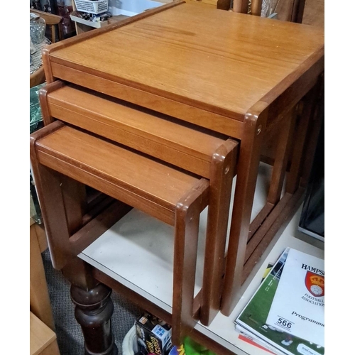 564 - Set of three Mid-Century Modern teak nesting tables.