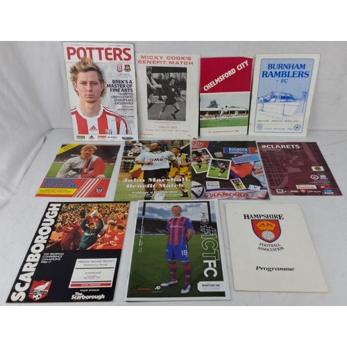 566 - Collection of 12 football match programmes, featuring teams including Stoke City, Sunderland, Colche... 