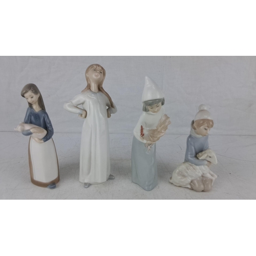 574 - Set of four Lladro porcelain figurines featuring young girls in various poses.