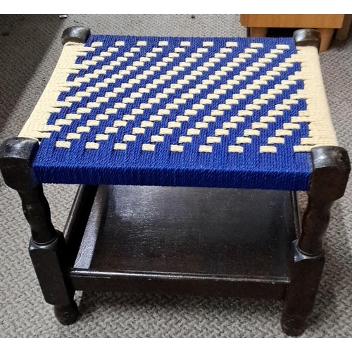 579 - Woven seat wooden footstool featuring blue and cream-colored pattern with an under-shelf, wooden fra... 