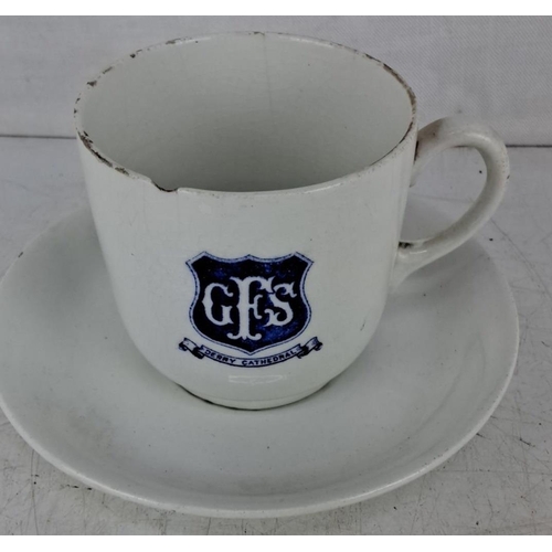 588 - Vintage Derry Cathedral GFS porcelain teacup and saucer set, featuring a blue emblem.