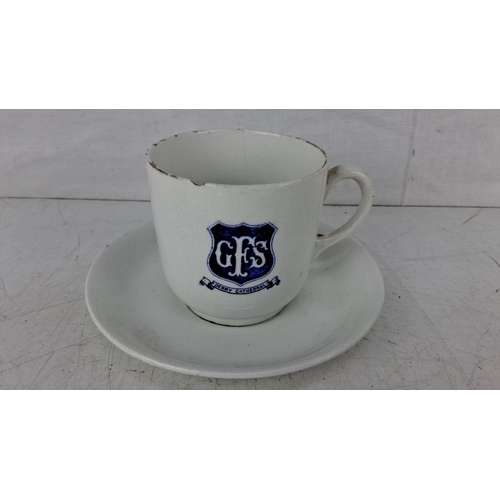 588 - Vintage Derry Cathedral GFS porcelain teacup and saucer set, featuring a blue emblem.