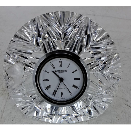 589 - Waterford Crystal desk clock with a quartz movement and encased in a radiant, faceted clear crystal ... 