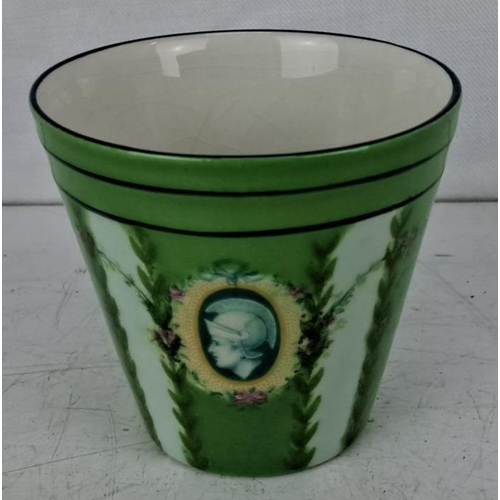 597 - W. H. Grindley & Co. Ltd. Royal Petals English ceramic cup. The cup features a green pattern with a ... 