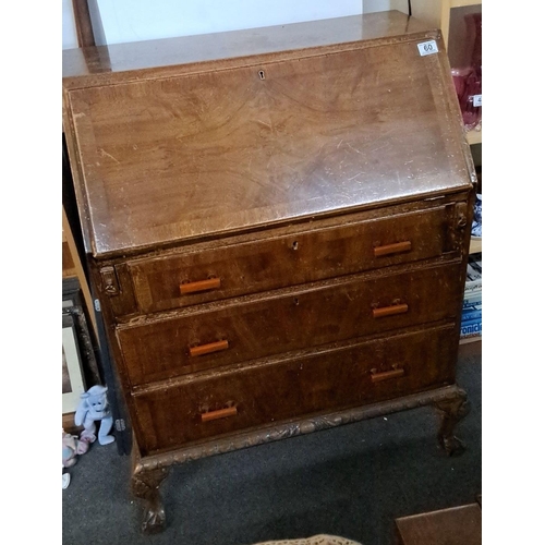 60 - Early 20th-century drop-front secretary desk. Made of mahogany with claw feet and interior compartme... 