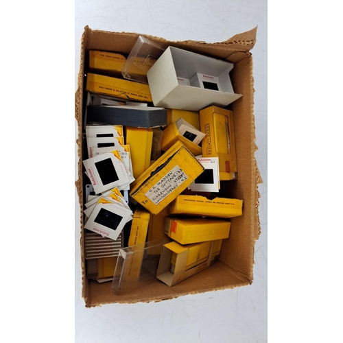 615 - A collection of assorted Kodak Kodachrome photographic slides, complete with original boxes and slee... 