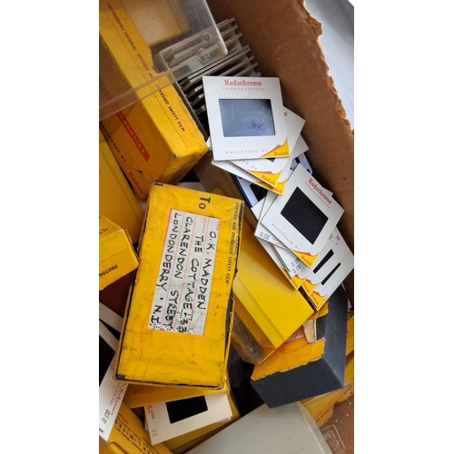 615 - A collection of assorted Kodak Kodachrome photographic slides, complete with original boxes and slee... 